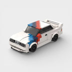 Vue avant de la BMW M3 E30 blanche en briques ABS Speedbrick
