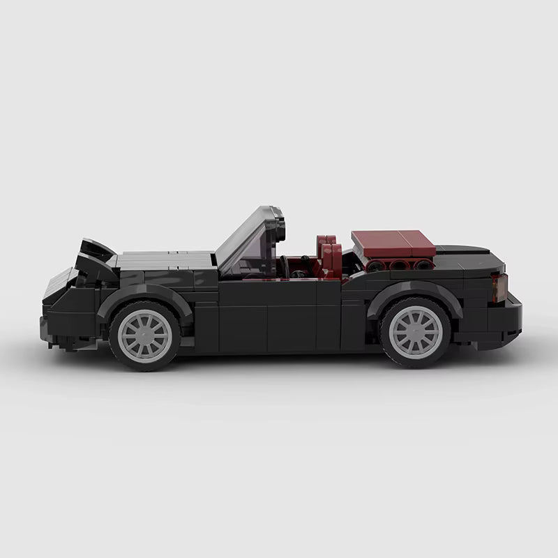 Vue de profil de la Mazda MX5 Miata noire en briques ABS Speedbrick