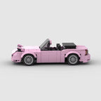 Vue de profil de la Mazda MX5 Miata rose en briques ABS Speedbrick