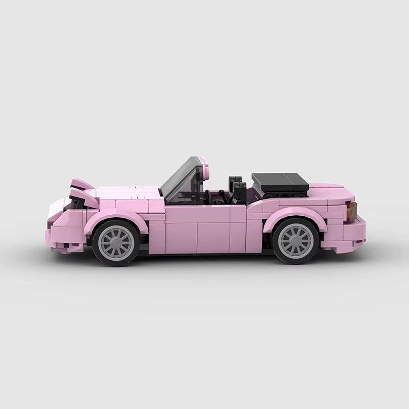Vue de profil de la Mazda MX5 Miata rose en briques ABS Speedbrick