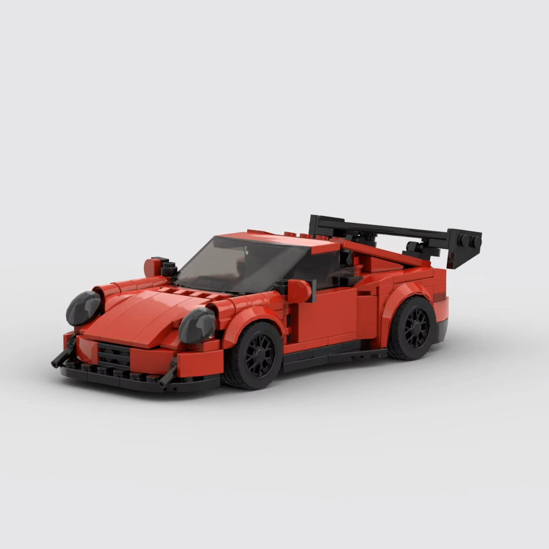Vue avant de la Porsche 911 GT3RS rouge en briques ABS Speedbrick